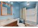 This bathroom is newly renovated and features classic fixtures and finishes at 4627 S Norfolk Way, Aurora, CO 80015