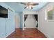 This bedroom features warm hardwood floors, closet, and lots of natural light at 4627 S Norfolk Way, Aurora, CO 80015
