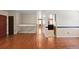 Hardwood floors leading to other rooms on the main level of the home at 4627 S Norfolk Way, Aurora, CO 80015