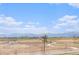 A scenic view of rolling fields and majestic mountains, captured from this homes vantage point at 5805 Red Barn Ave, Longmont, CO 80504