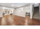 Spacious finished basement featuring hardwood floors and multiple functional areas at 670 S Oswego St, Aurora, CO 80012