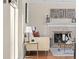 Living room with a fireplace and neutral color palette at 670 S Oswego St, Aurora, CO 80012