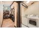 Walk-in closet and laundry room featuring washer and dryer at 21437 Alta Dr, Morrison, CO 80465