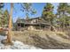 Stunning multi-level deck home with beautiful views and mature trees at 21437 Alta Dr, Morrison, CO 80465
