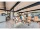 Spacious living room with bar seating overlooking kitchen, dining area, and exterior views at 21437 Alta Dr, Morrison, CO 80465