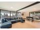 Spacious living room with large windows providing natural light at 21437 Alta Dr, Morrison, CO 80465