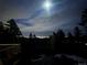 Scenic night view from the property with city lights in the distance at 21437 Alta Dr, Morrison, CO 80465