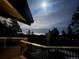 Scenic night view from the property with city lights in the distance at 21437 Alta Dr, Morrison, CO 80465