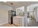 Kitchen features granite countertops and a view into the living room at 1334 Xavier St, Denver, CO 80204