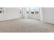 Bright bedroom featuring neutral carpet, white walls and natural light at 9673 Ceylon St, Commerce City, CO 80022