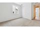 Bright bedroom with neutral carpet and a large closet at 9673 Ceylon St, Commerce City, CO 80022