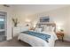 Comfortable bedroom features neutral walls, plush carpet, and stylish décor at 10370 Routt St, Westminster, CO 80021