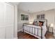 Charming bedroom with hardwood floors, a large closet, and a bright window at 10370 Routt St, Westminster, CO 80021
