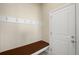 Functional mudroom with a bench and hooks for organization, perfect for busy families at 15779 W 83Rd Pl, Arvada, CO 80007
