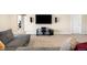Finished recreation room with a TV and sound system for entertainment at 15779 W 83Rd Pl, Arvada, CO 80007