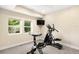 A private workout room featuring large windows, natural light and ceiling fan at 15779 W 83Rd Pl, Arvada, CO 80007
