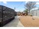 Backyard featuring garden beds, gravel area, landscaping and walkway at 4849 N Cook St, Denver, CO 80216