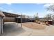 Spacious backyard featuring gravel area, patio, and landscaping at 4849 N Cook St, Denver, CO 80216