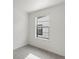 Sunlit bedroom featuring plush carpeting, a large window, and neutral tones creating a serene atmosphere at 2042 S Holly St # 3, Denver, CO 80222