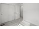 Bedroom with closet storage that has an additional room with a door entrance at 2042 S Holly St # 3, Denver, CO 80222