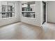Well-lit room featuring large windows that provide ample natural light and views, as well as modern blinds at 2042 S Holly St # 3, Denver, CO 80222