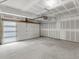 Spacious garage with a modern door and ample room for parking and storage at 2042 S Holly St # 3, Denver, CO 80222