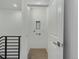 Bright laundry room area with hookups and utility drain offers practicality and convenience at 2042 S Holly St # 3, Denver, CO 80222