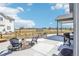 Relax in this peaceful backyard with a large concrete patio, fire pit, and beautiful view. Enjoyable! at 1702 Metcalf Dr, Erie, CO 80516