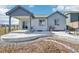 Enjoy the outdoors with this home's beautiful concrete patio and landscaped backyard with irrigation at 1702 Metcalf Dr, Erie, CO 80516