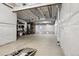 Unfinished basement showcasing insulated walls and a cement floor for easy customization and storage at 1702 Metcalf Dr, Erie, CO 80516