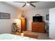 Spacious bedroom featuring wooden furniture, overhead fan, and natural light at 14091 E Marina Dr # 612, Aurora, CO 80014