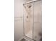 Modern shower with a sleek glass door, chrome fixtures, and a clean, tiled interior at 14091 E Marina Dr # 612, Aurora, CO 80014