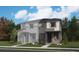 New two-story home with stone accents, a covered porch and professional landscaping in a desirable neighborhood at 6678 N Nepal Ct, Aurora, CO 80019