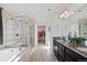 Bathroom with double vanity, soaking tub, and shower at 39260 Braxton Ln, Elizabeth, CO 80107