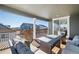 Relaxing deck with seating area and view of the surrounding houses at 39260 Braxton Ln, Elizabeth, CO 80107