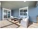 Spacious deck features comfortable seating and sliding glass doors at 39260 Braxton Ln, Elizabeth, CO 80107