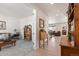 Entryway with wood floors, showing a sitting area and access to other rooms at 39260 Braxton Ln, Elizabeth, CO 80107