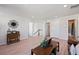 Upstairs living area with multiple rooms and lots of natural light at 39260 Braxton Ln, Elizabeth, CO 80107