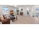 Open living space with a view into a Primary bedroom and lots of light at 39260 Braxton Ln, Elizabeth, CO 80107