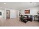 Spacious living area with a comfortable couch and decorative accents at 39260 Braxton Ln, Elizabeth, CO 80107