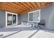 Covered patio with seating area and access to the interior at 39260 Braxton Ln, Elizabeth, CO 80107