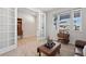 Sitting area with a view into another room and access to an office at 39260 Braxton Ln, Elizabeth, CO 80107