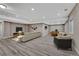 Finished basement boasts sleek flooring, a spacious layout, and a pool table, perfect for entertaining and recreation at 7646 Greenwater Cir, Castle Rock, CO 80108