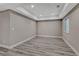 Unfurnished basement features modern flooring, recessed lighting, and ample space, ready for your personal design at 7646 Greenwater Cir, Castle Rock, CO 80108