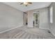 Spacious bedroom featuring neutral walls, plush carpet, and ample closet space, offering a serene retreat at 7646 Greenwater Cir, Castle Rock, CO 80108