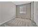 Neutral bedroom with new gray carpet and white trim for a modern look at 7646 Greenwater Cir, Castle Rock, CO 80108