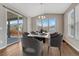Bright dining room features sliding glass doors and ample natural light at 7646 Greenwater Cir, Castle Rock, CO 80108