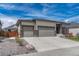 Charming home exterior with a 3 car garage and a well maintained yard at 7646 Greenwater Cir, Castle Rock, CO 80108
