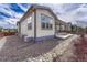 Charming home exterior with a stone pathway, well maintained yard, and great curb appeal at 7646 Greenwater Cir, Castle Rock, CO 80108