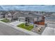 Attractive single story home featuring a three car garage, stone accents, and a manicured front lawn with a tree at 7646 Greenwater Cir, Castle Rock, CO 80108